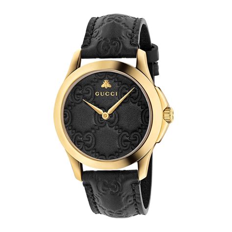 gucci watch black and gold.